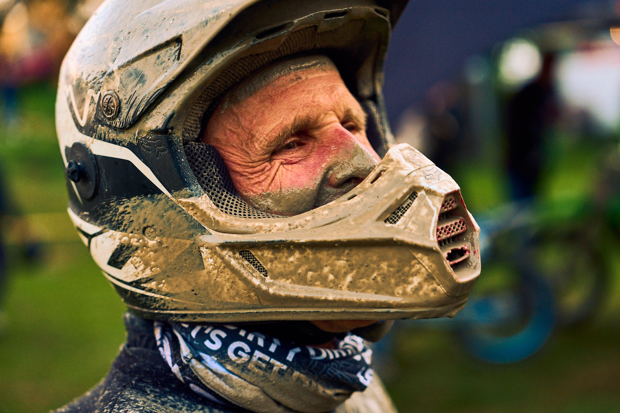 Flat track rider with a mud-covered helmet after the rain set in at the German Flat Track Cup final in Moorwinkelsdamm